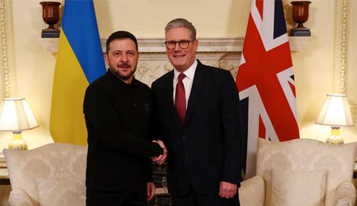 (Peter Nicholls/Pool Photo via AP)